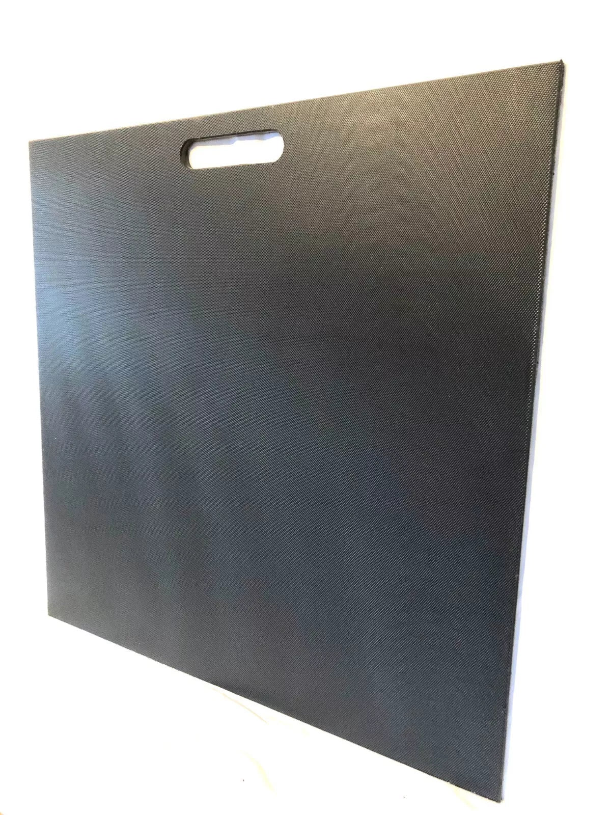 Durable & portable plastic spot board for builders, also known as a mortar board, used for holding and mixing cement and mortar on construction sites.