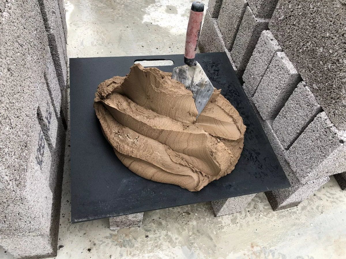 Durable & portable plastic spot board for builders, also known as a mortar board, allows positioning of mortar or cement within quick and easy reach